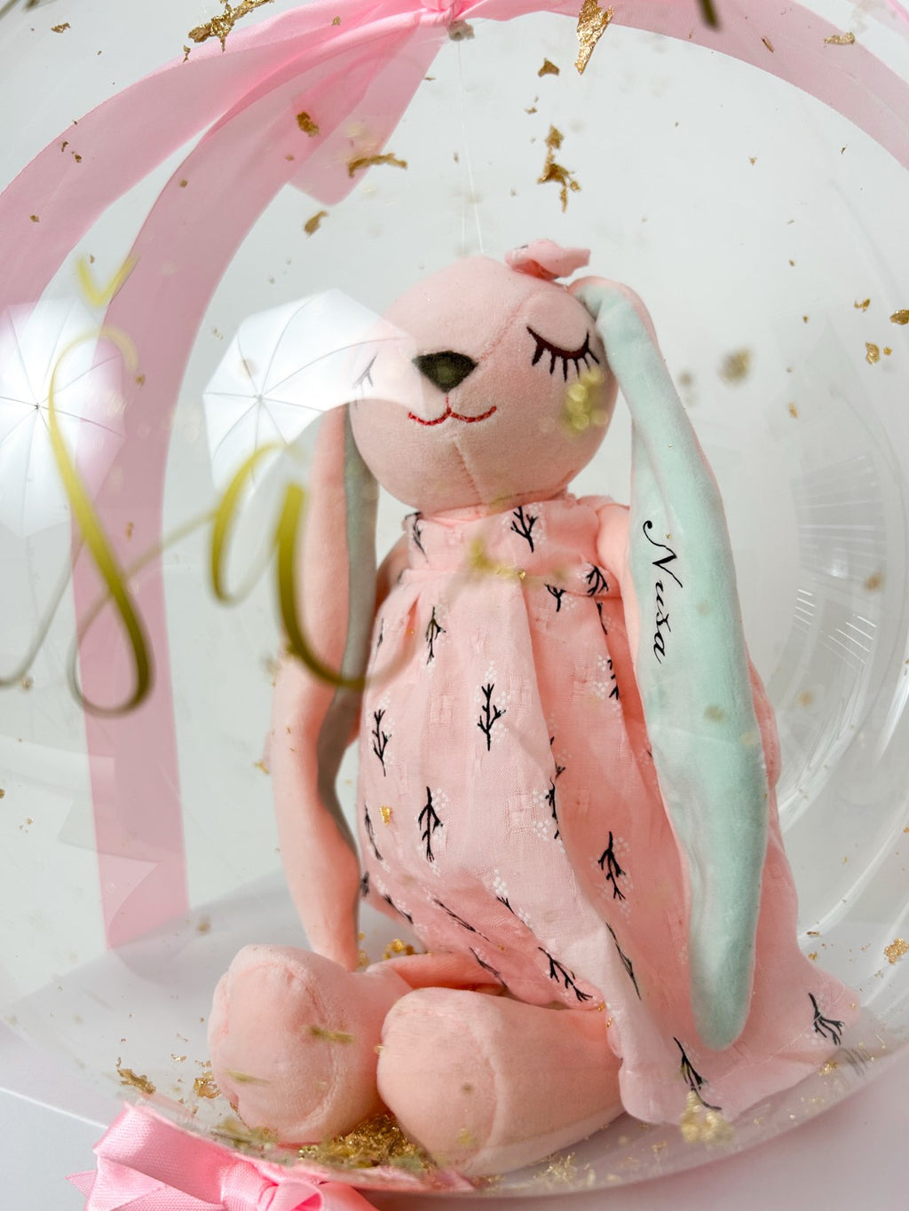 Balon ob rojstvu otroka z igračo roza