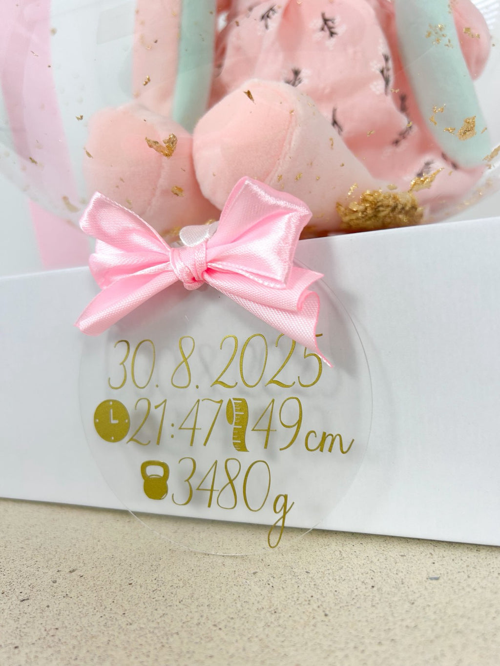 Balon ob rojstvu otroka z igračo roza