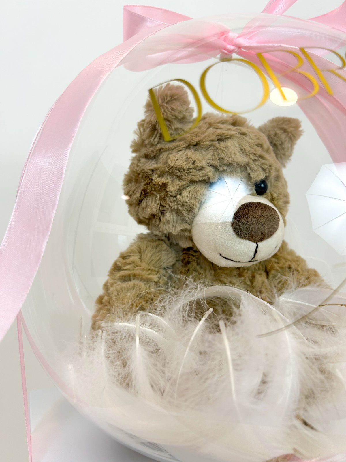 Balon ob rojstvu otroka z igračo roza